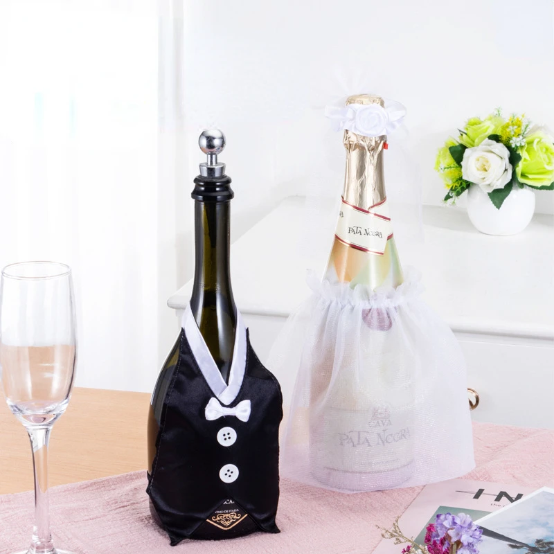 S03914ecb649e45eca8a42b3fb39ca19a7.webp 2Pcs Wedding Bottle Cover Bride Groom Wine Cups Champagne Glasses Ornaments Bride To Be Bridal Shower Bachelorette Party Decor - Image 1