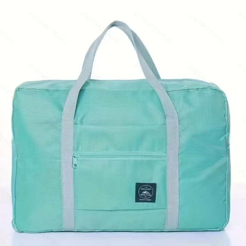 S75b2143e6dbc4cfd9635db89afe224d5U.webp Travel Bag Folding Travel Storage Bag Travel Storage Bags Boarding Luggage Clothes Handbags Picnic Move House Large Handbag - Image 1