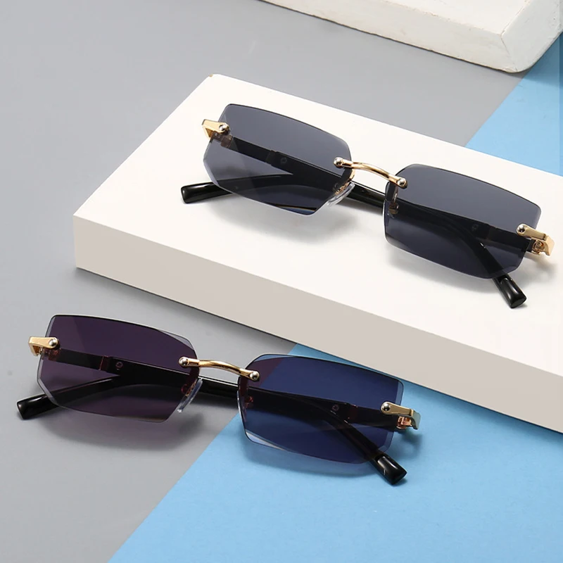 S83573443deb54d4590f897cb1172d5f5J.webp Fashion Rimless Sunglasses Men Women Populare Frameless Sun Glasses Male Female Classic Small Square Summer Traveling Shades - Image 1