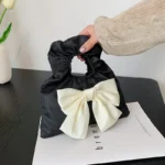 New Pu Leather Girl Concave Shape Portable Pleated Bag Texture Bow Hand Carry Ladies Small Bag Ladies Cell Phone Bag